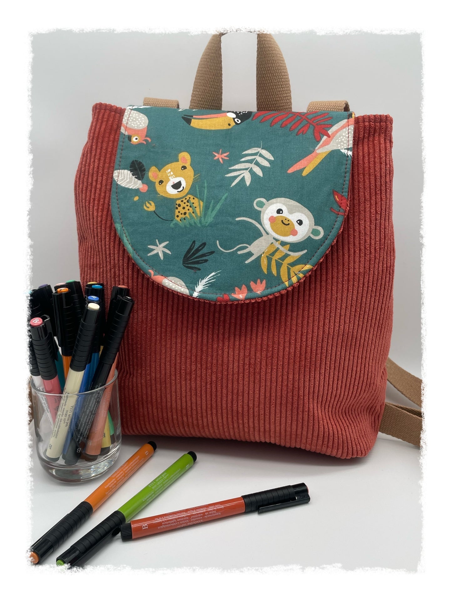 Sac à dos Choupy Velours brique et imprimé animaux jungle